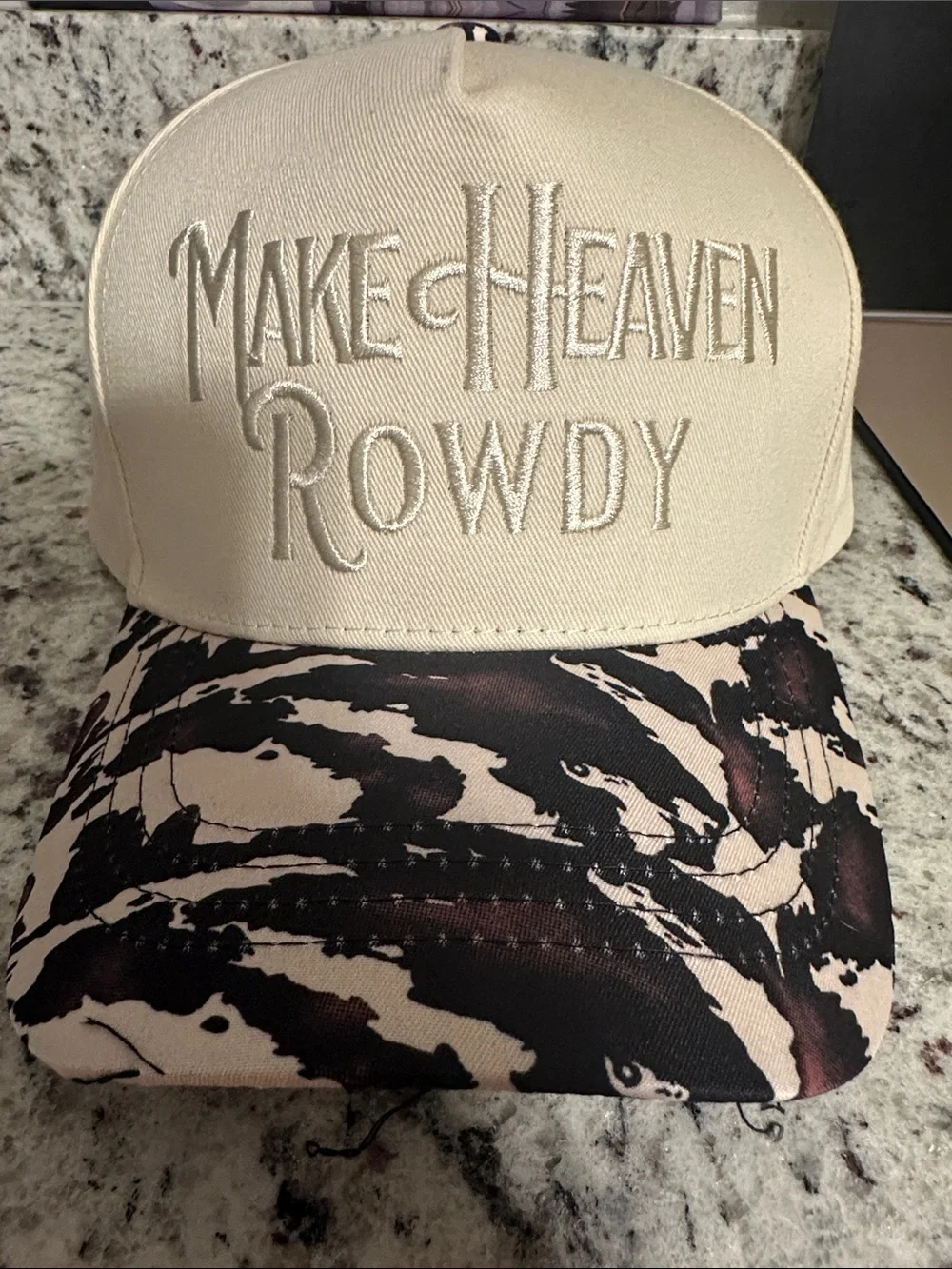 Make Heaven Rowdy Embroidered Trucker Hat - Cream & Black Pattern